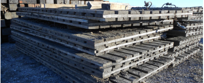 used construction mats stacked