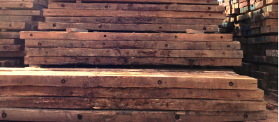 used construction mats stacked